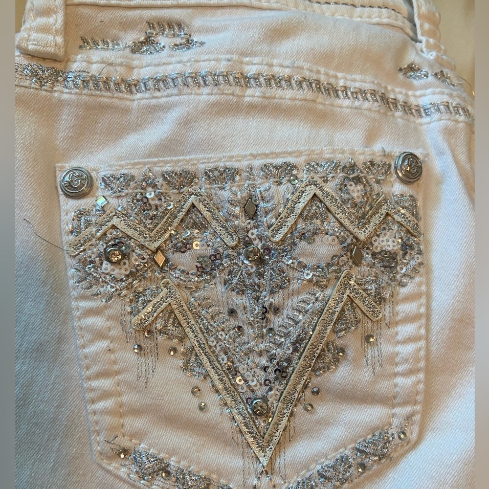 Grace white bootcut jeans